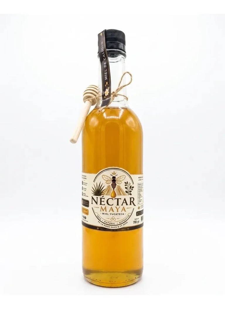 Bottle of Nectar Agave spirit with golden liquid, sealed with a black stopper and decorative twine